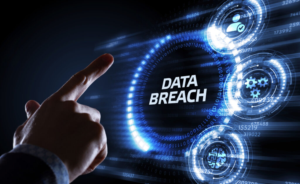 A businessman touching Data Breach on virtual screen describing Block data breach class-action lawsuit.