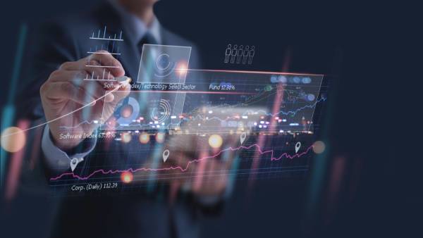 Front view of an image, A businessman drawing a graph indicating the trade solutions.